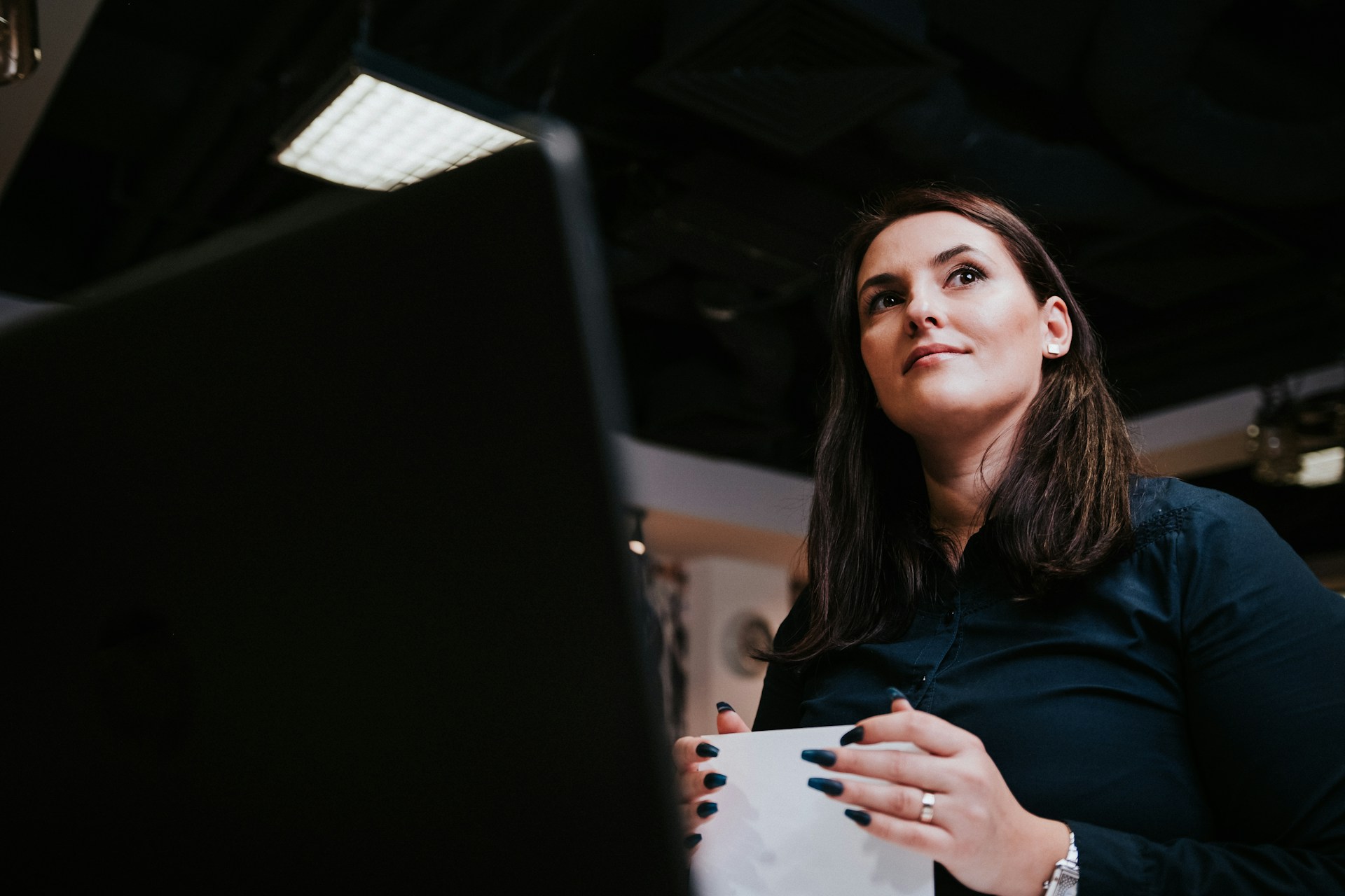 Businesswoman looking at a screen